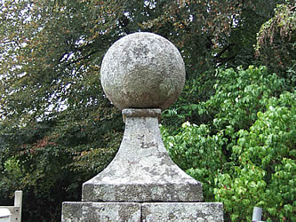 Granite finial and sphere on gate post